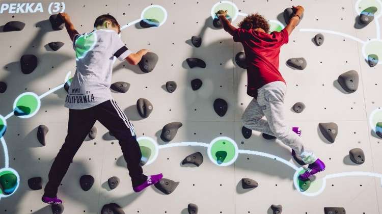 Augmented Climbing Wall Invigorates Activity Parks with Interactive Climbing
